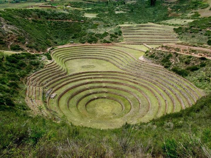Moray terraces, Sacred Valley Concentric circular Inca farming terraces of Moray surrounded by green hills