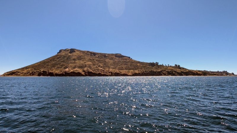 Amantani island seen from a boat crossing Lake Titicaca
