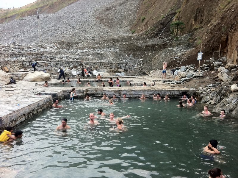 Bathers in the open-air pools of the Cocalmayo hot springs near Santa Teresa