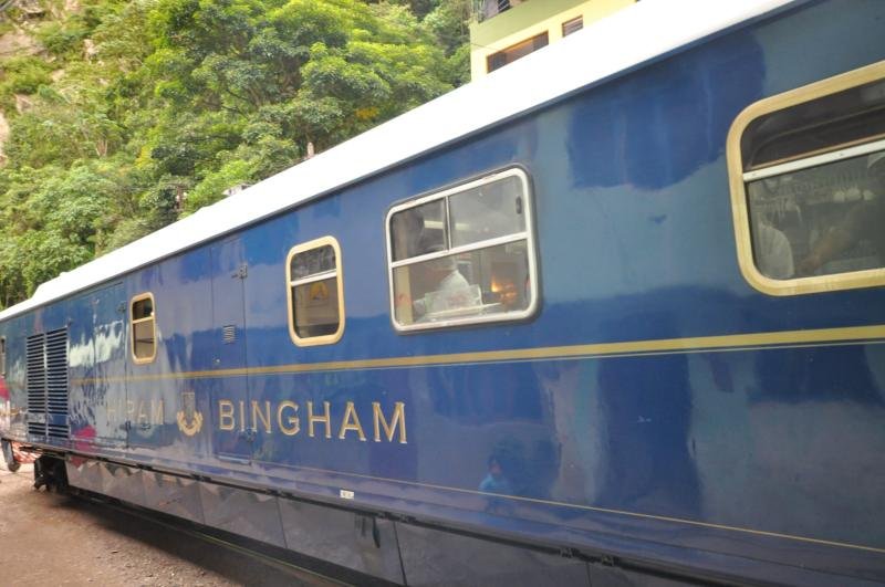 Blue and gold Hiram Bingham carriage of PeruRail on the Cusco to Machu Picchu line