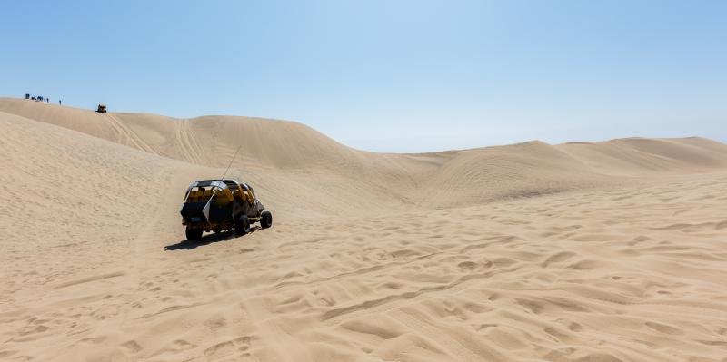 Dune buggy crossing the sand dunes above Huacachina