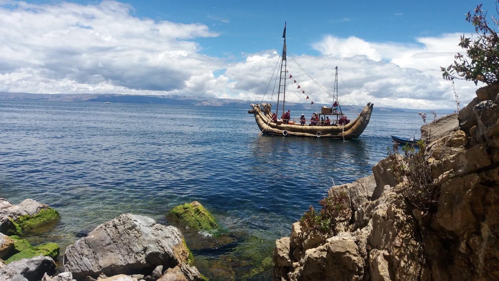 Traditional reed boat on the water off Isla del Sol in Lake Titicaca