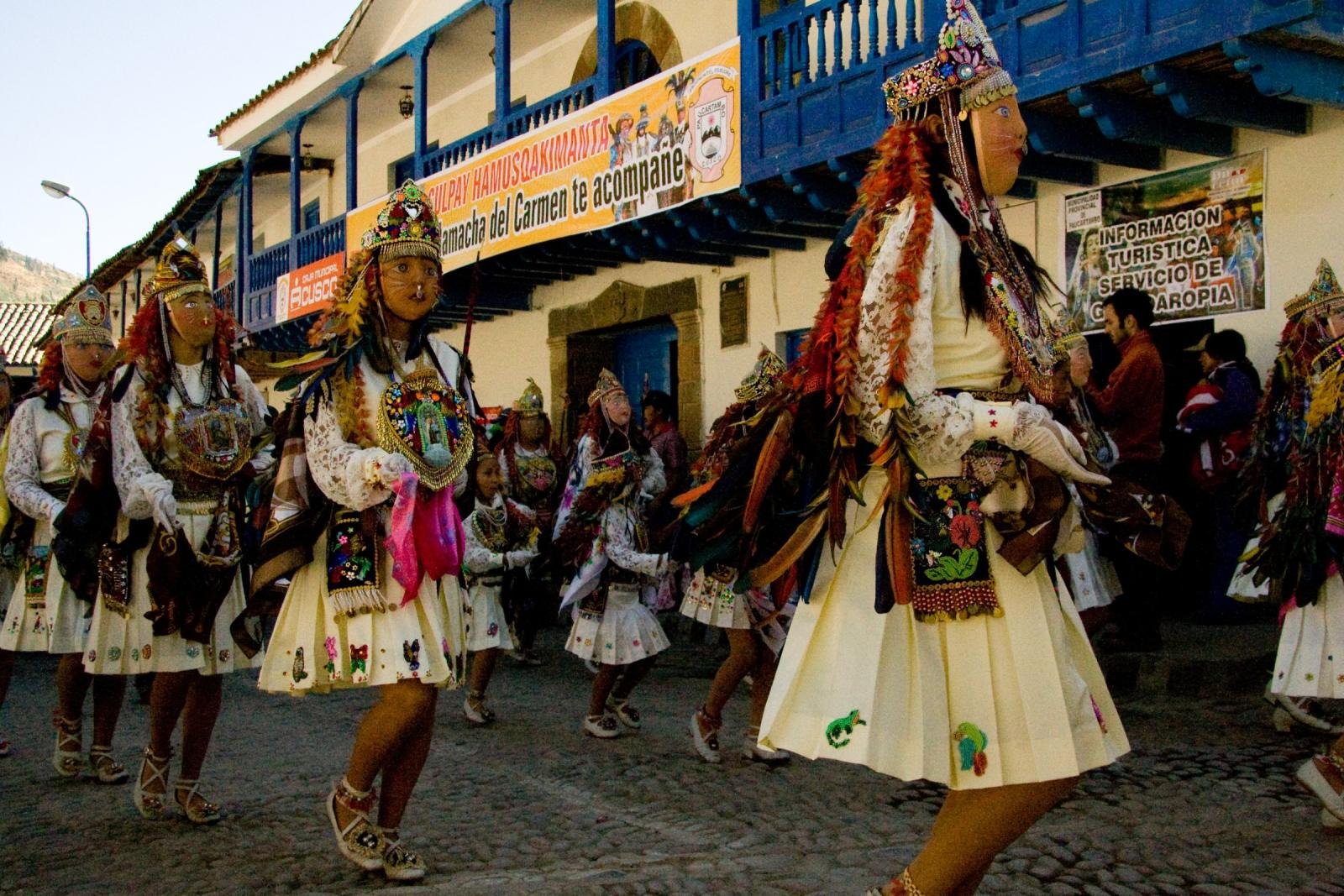 Virgen del Carmen dancers, Paucartambo Masked dancers of the Virgen del Carmen festival in a street of Paucartambo