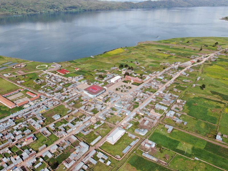 Aerial view of Layo village and its fields beside Lake Langui Layo