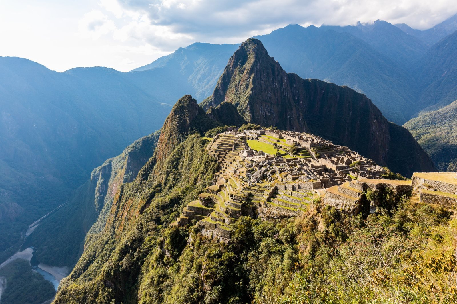 The citadel of Machu Picchu seen from the upper terraces on a sunny morning