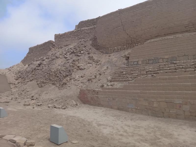 Weathered adobe ramps and walls of the Temple of the Sun at Pachacamac