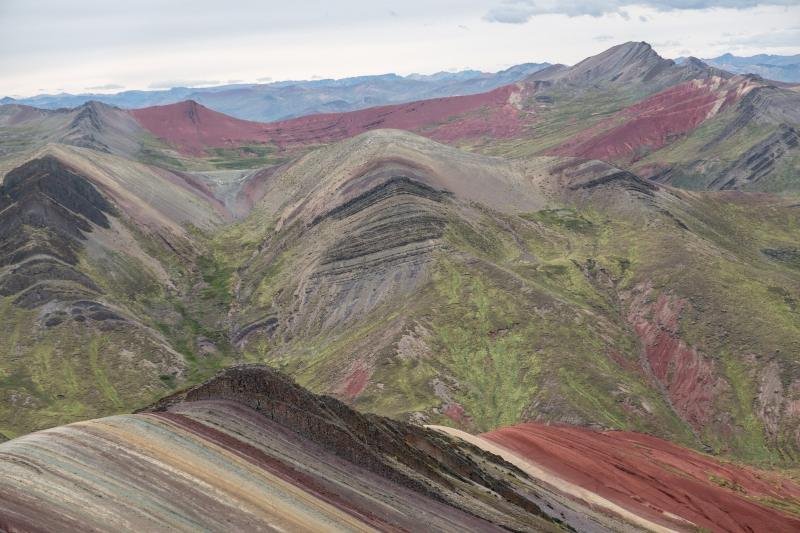 Striped red, ochre and green ridges of the Palccoyo rainbow range