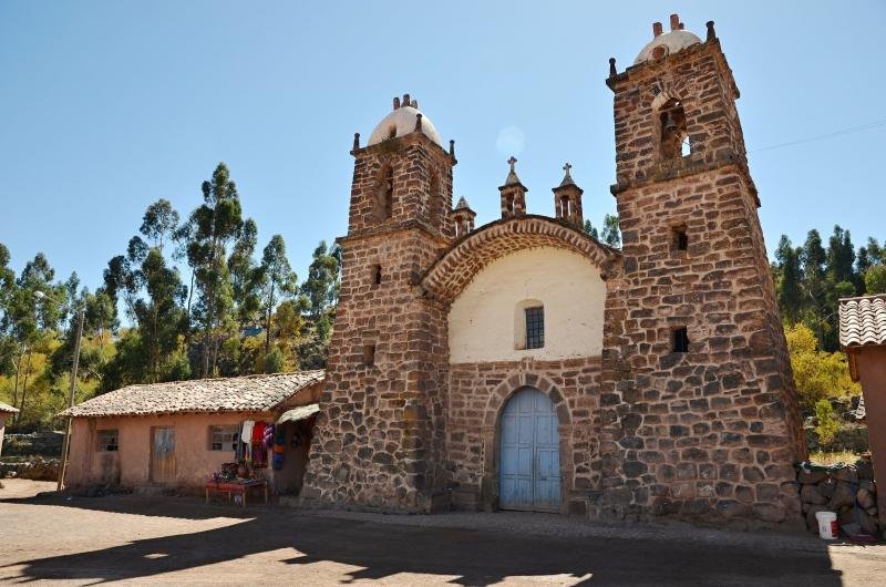 Tall adobe wall of the Temple of Wiracocha at Raqchi