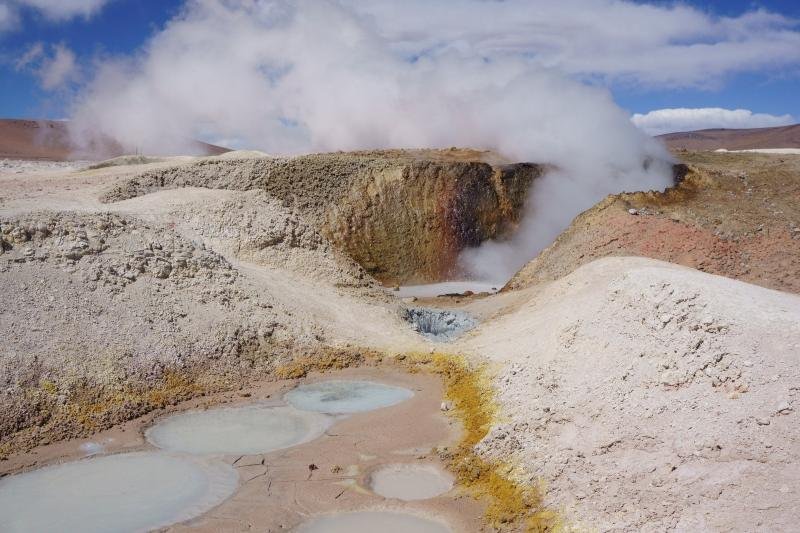 Steaming mud pools at the Sol de Manana geyser field