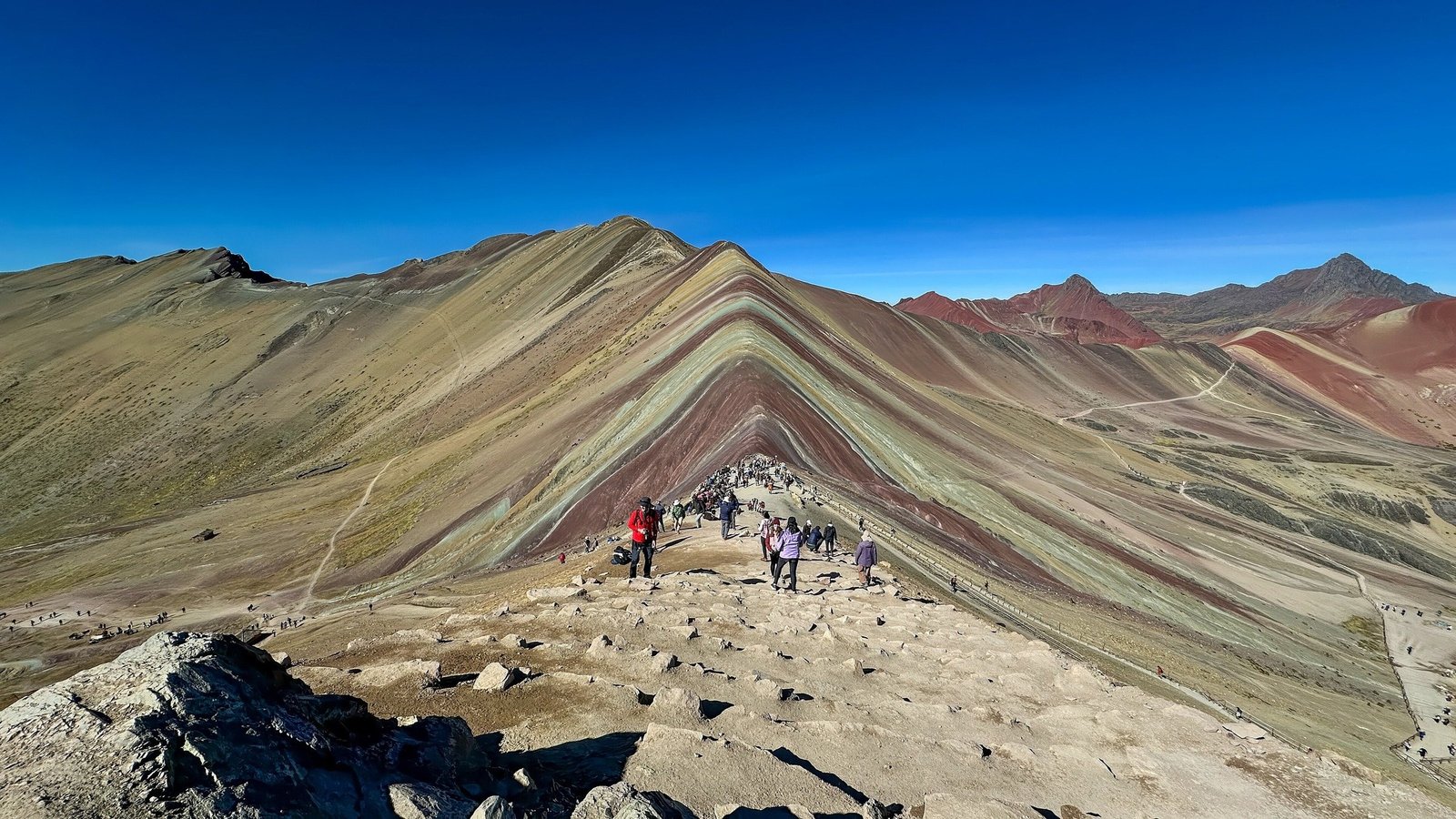 Vinicunca Rainbow Mountain Striped mineral slopes of Vinicunca, the Rainbow Mountain, under a clear sky